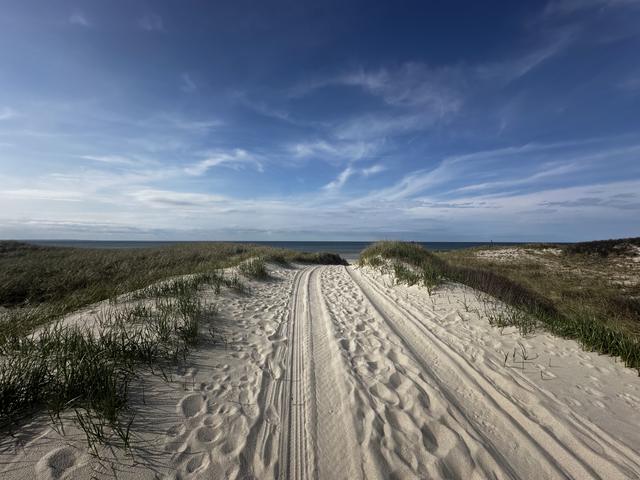 The sand road over the dunes.