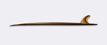 The striped wooden surfboard in side profile with its fin